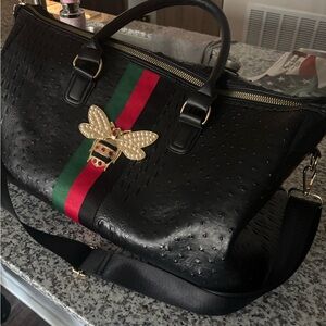 Others Follow Black Travel Bag with Gold Bee Accent